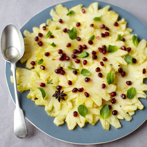 Kruidige ananas met granaatappelpitjes