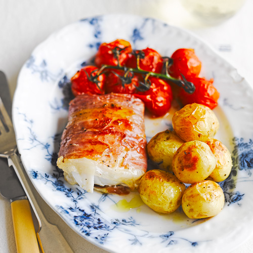 Koolvis met tomaten uit de oven