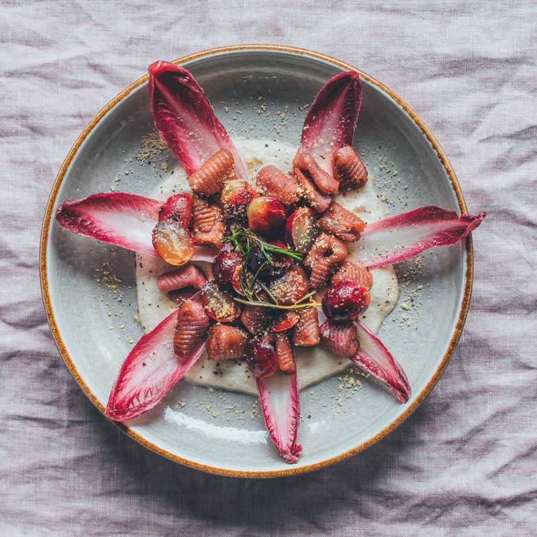 Gnocchi met zuurkoolsaus en druiven